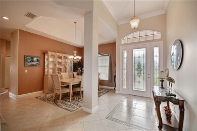 Elegant foyer entry next to formal dining room