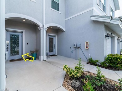 Entrance to property with a garage