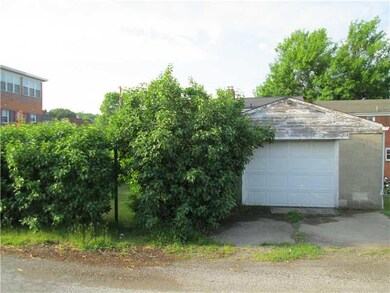 Parking Lot/Garage. One car garage with alley acce