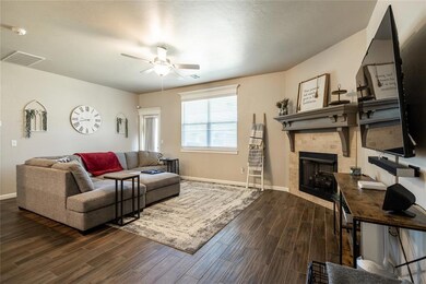 Living room featuring dark hardwood / wood-style f