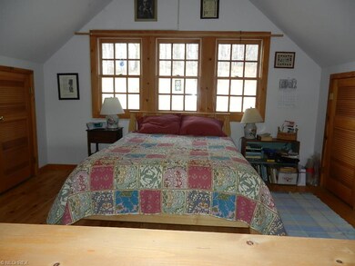 Spacious loft area with two closets.