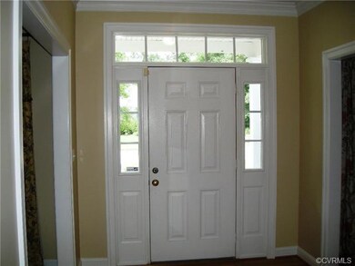 Front door with side lights and transom window