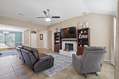 Warm and inviting white brick fireplace is a cozy 