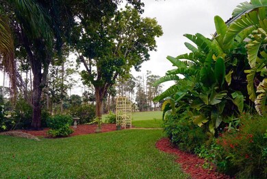 245 Button Bush Ln, Wellington, FL 33414 - photo 6