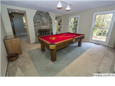Daylight basement den is huge with see through fir