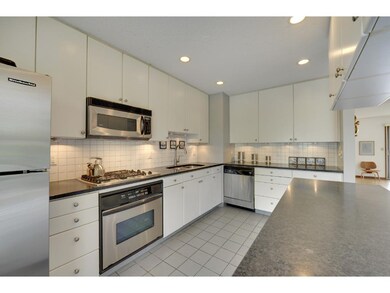 Another view of the kitchen, which has a ton of co