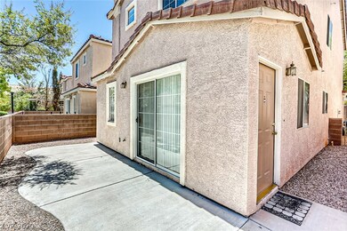 Entry from community walkway to property with larg