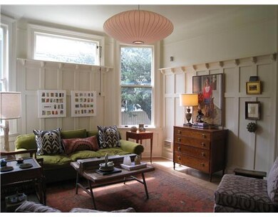 Living Room. Fabulous wood detailing, original bur