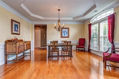 Sizable Formal Dining Room with tray ceiling can a