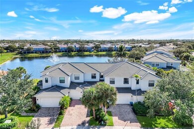 Aerial perspective of suburban area with a nearby body of water