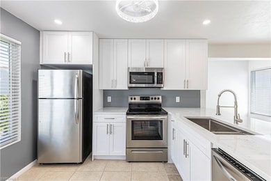 Kitchen with stainless steel appliances