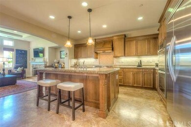Kitchen with large center island, subway tile back
