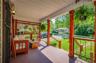 Enjoy tea with friends on your front porch, while 