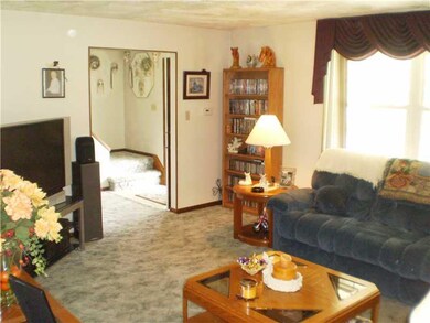 Living Room. Living room measures approximately 19