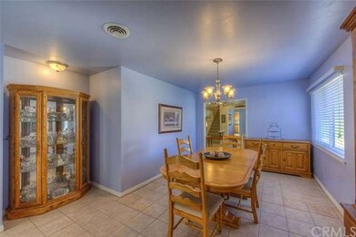 Large dining room adjacent to the kitchen that flo
