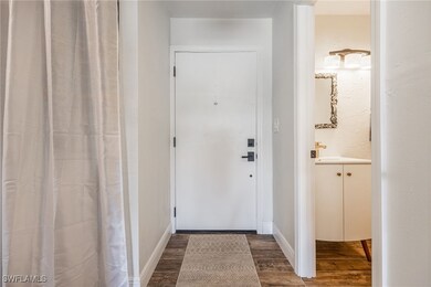 Front Entrance leading to hallway/foyer. 1/2 Bath