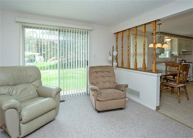The eat-in kitchen is open to the family room with