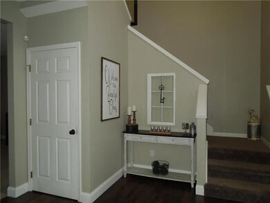 Beautiful entry way with gorgeous refinished wood 