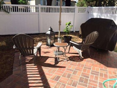 Large back patio with brick and lots of space for 