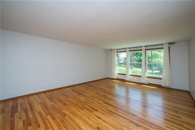 The spacious 20x15 living room is just off the mai