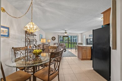 Dining room featuring light tile patterned floors,