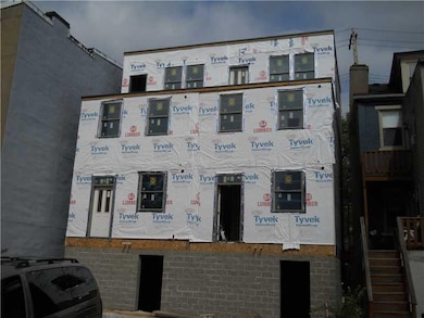 Exterior Back. Rear deck with city view, off stree