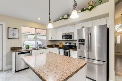 Bright kitchen w white cabinets