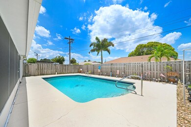 With Inviting Backyard Pool