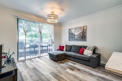 Living room featuring crown molding, new luxury vi