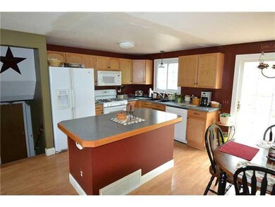 Kitchen. Island kitchen is fully applianced.