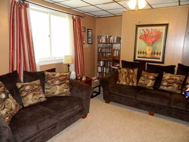 Living Room. New carpet was installed throughout t