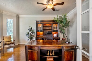 A handsome study is just off the entry and has gle