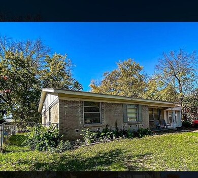View of front of house with a front yard
