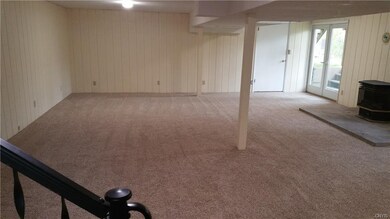 Newly Carpeted lower level with walkout to rear ya