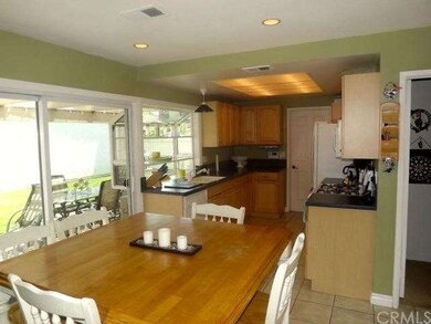 Remodeled Kitchen with Maple Cabinets and Corian C