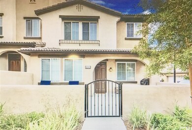 Front area with enclosed, gated patio which has pl