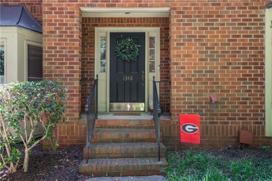 Property entrance with brick siding