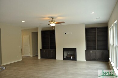 Great Room with Fireplace & Built In Bookcases