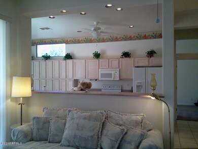 View living room to kitchen