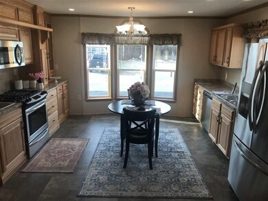 Staged furniture not included as part of sale. Pic