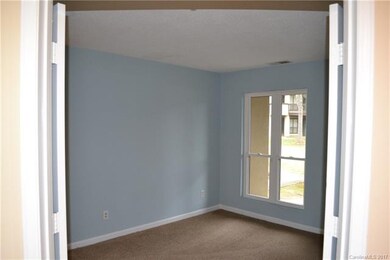 Front bedroom with double doors.  Both bedrooms ha