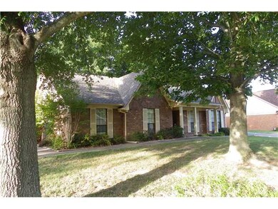 Mature trees in front and rear yard