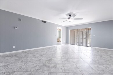 Empty room with baseboards, ceiling fan, visible v