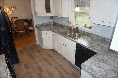 Dine-in kitchen has plenty of cabinets for storage