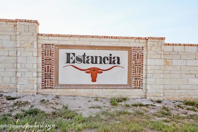 Estancia Sign on Stone Gate