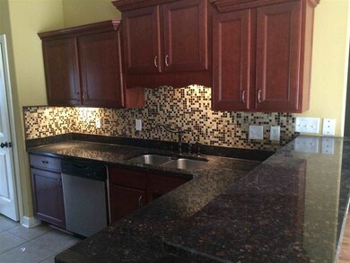 Stainless steel appliances, granite countertops, t