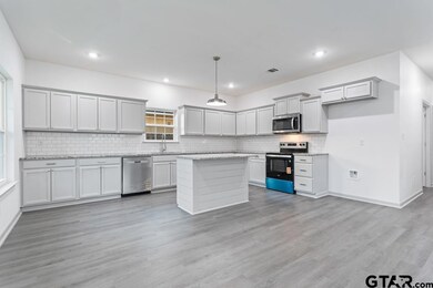 214 Hurley Ave, Gladewater, TX 75647 - photo 7