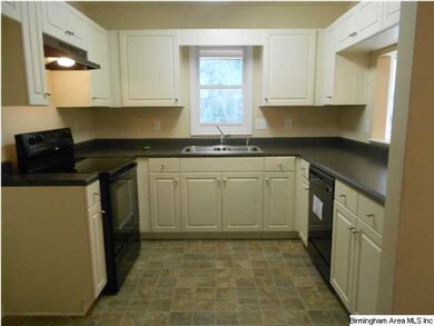 Large U-Shaped Kitchen with Breakfast Bar