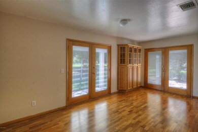 Family room with pella doors.