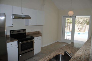 Granite in the kitchen w/ high ceiling